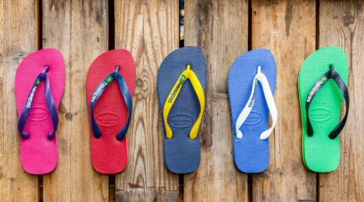 A row of multi-coloured Havaianas flip flops.