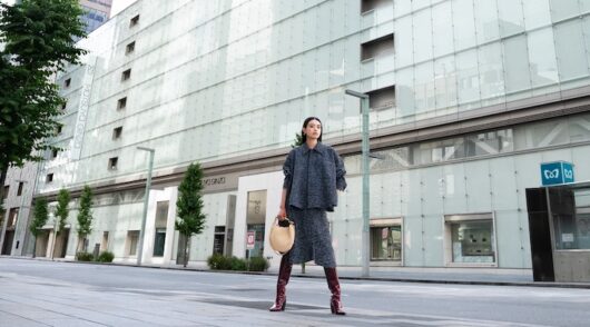 A model standing in front of Matsuya Ginza department store