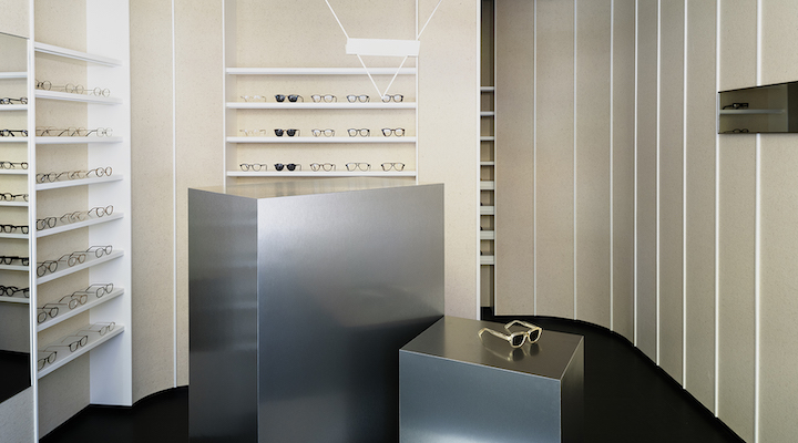 An interior shot of the Cubitts store in New York City, showing eyeglasses on minimalist shelving