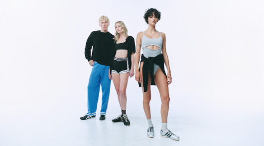 Three models standing in Nagnata athleisure apparel.