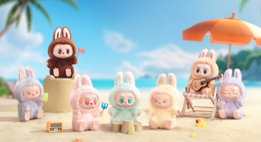 Variously colored Labubu dolls hanging out on a beach.