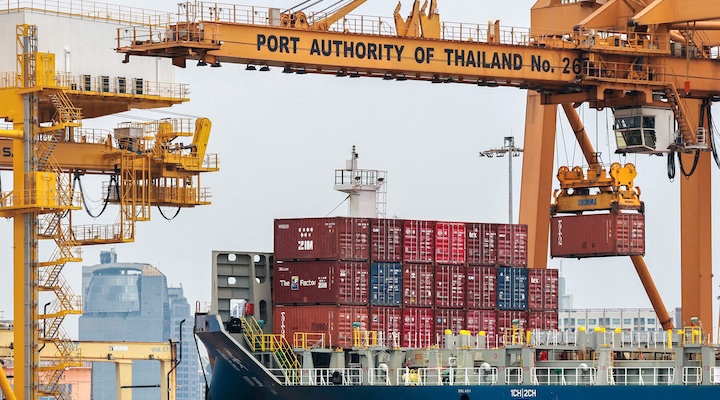 Cargo ships are loaded with containers