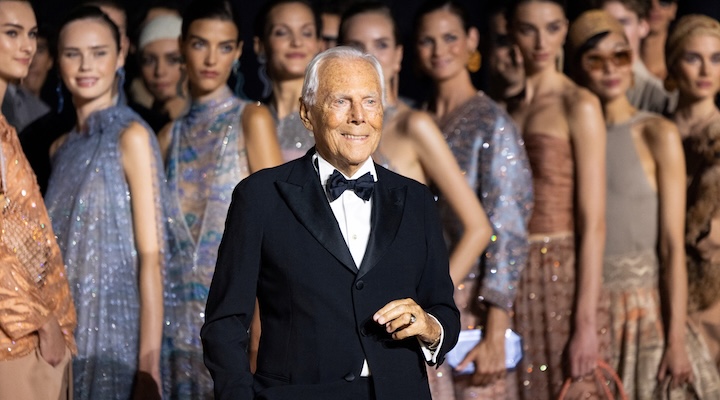 Giorgio Armani poses with models before presenting his Spring Summer 2025 collection.