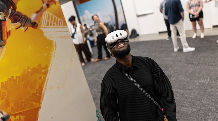 A visitor experiences VR devices during the Meta annual Connect conference.