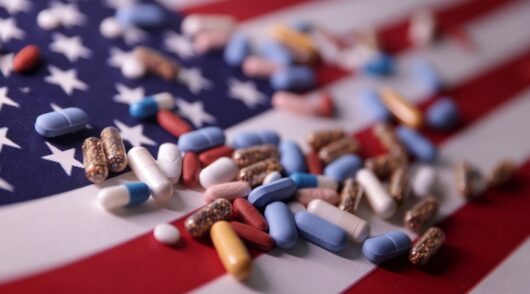 Illustration of US flag and medicines