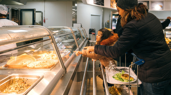 Family ordering food at Ikea