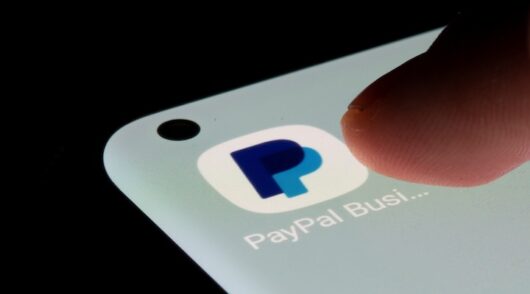 PayPal app is seen on a smartphone