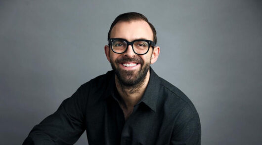 A headshot of Coach’s senior vice president of visual experience Giovanni Zaccariello.