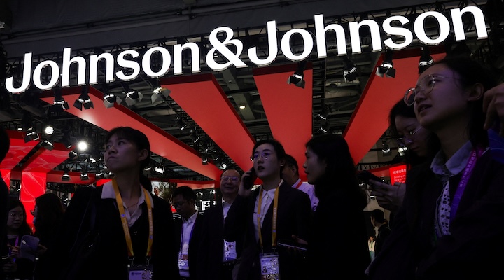 People gather at the booth of Johnson & Johnson