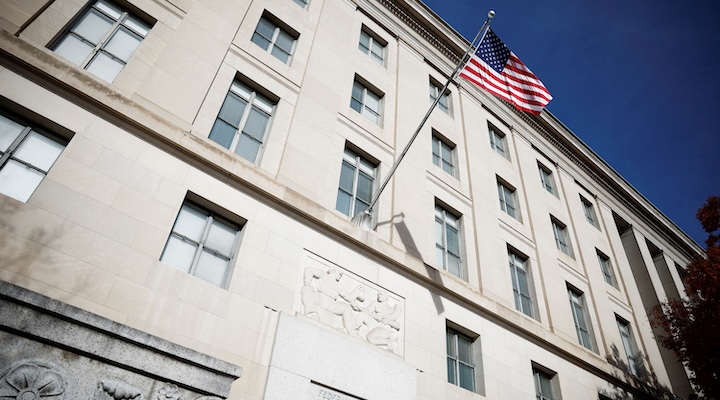 A US flag flutters at the Federal Trade Commission (FTC) headquarters