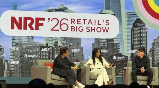(left to right) Shopify president Harley Finkelstein sitting next to Emma Grede, the co-founder of Skims, and Ben Francis, the CEO and founder of Gymhark.