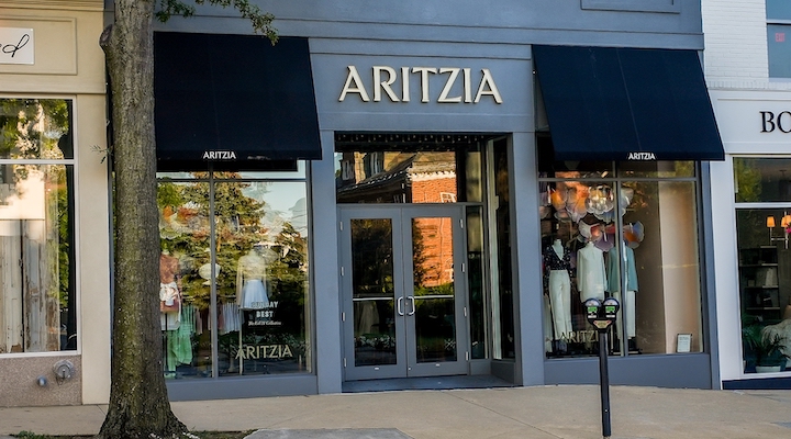 An exterior shot of an Aritzia storefront.
