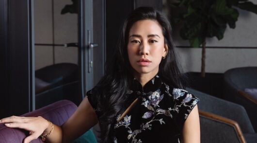 Sau Lee founder Cheryl Leung wearing a black-and-white qipao dress.