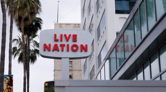 A Live Nation sign stands next to an office building along Hollywood Blvd