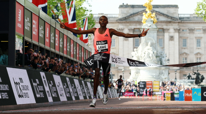 Runner breaks marathon record.