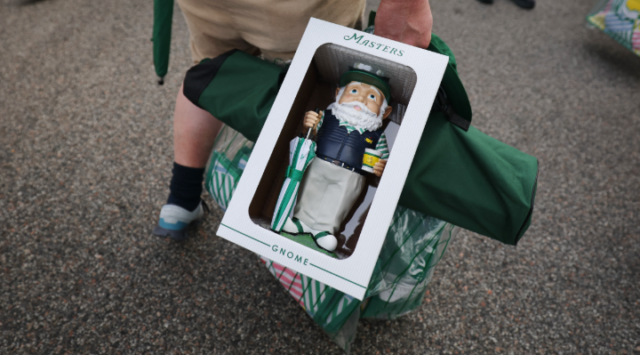 Masters gnome in shopper’s hand.