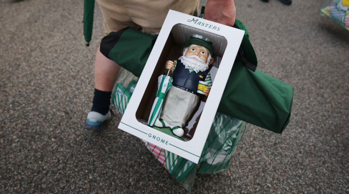 Masters gnome in shopper’s hand.