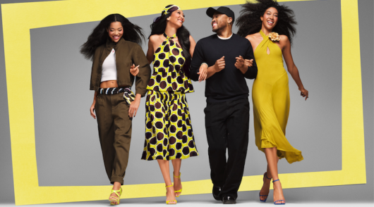 (Left to right) Models Ming Lee Simmons, Aoki Lee Simmons and Kimore Lee Simmons standing next to designer Christopher John Rogers.