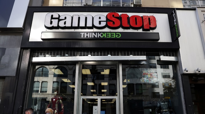 People walk by a GameStop in Manhattan, New York, US