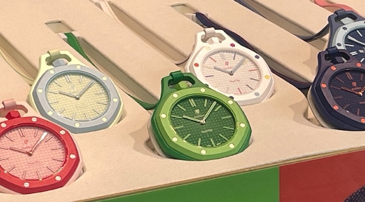 Audemars Piguet and Swatch 'Royal Pop' watches are on display.