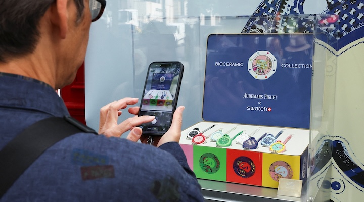 In Milan, shoppers outside a Swatch store ended up in a scuffle.