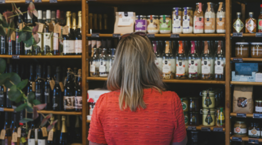 woman choosing liquor