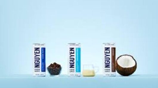 Olive oil bottles on blue background.