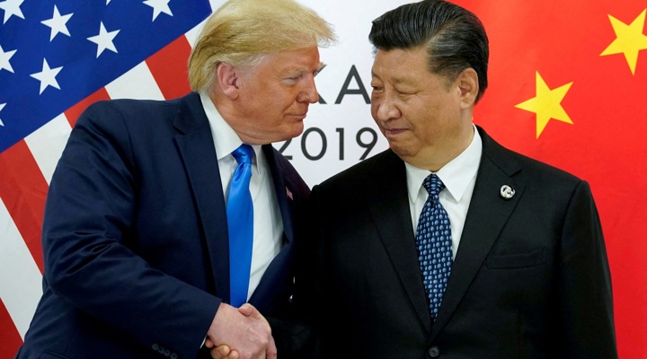 Trump and Xi shake hands.