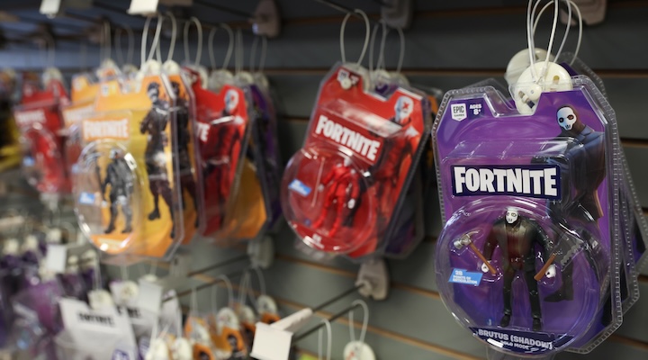 Figurines from the game Fortnite are seen for sale in a GameStop