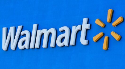 The Walmart logo is shown on one of their super stores in San Diego