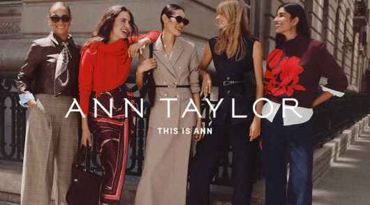 Several female models standing on the street, wearing Ann Taylor.