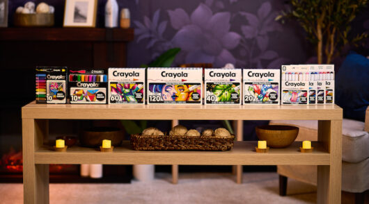 Several items from Crayola’s All Grown Up collection laid out on a table.