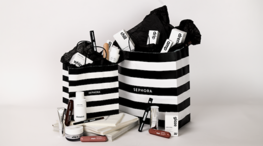 Multiple POV Beauty items inside several Sephora bags.