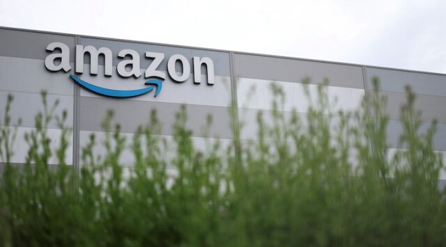 The logo of Amazon is pictured at a company logistics center