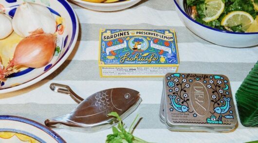 Dieux Skin x Fishwife’s limited edition eye patches set up on a grocery store shelf.