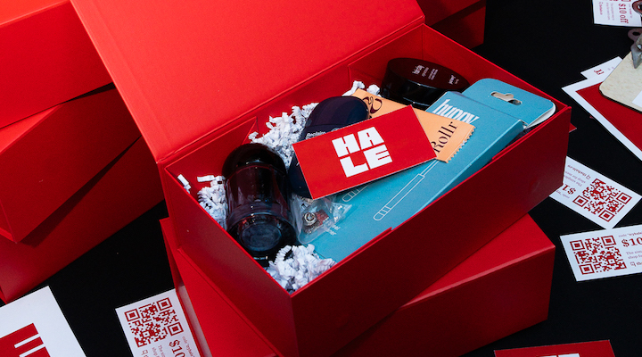 A red box full of curated beauty products from men's beauty shopping platform Hale.