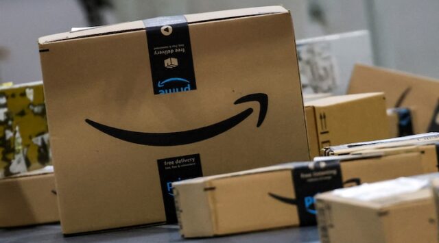Boxes lie on a conveyor belt during Cyber Monday at Amazon's fulfillment center in Robbinsville