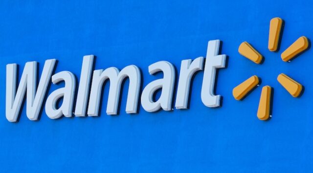 The Walmart logo is shown on one of their super stores in San Diego