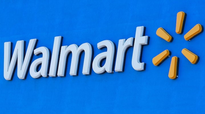 The Walmart logo is shown on one of their super stores in San Diego